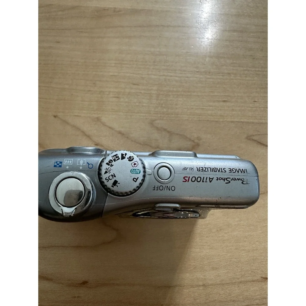 Canon PowerShot A1100 IS 12.1MP Digital Camera Silver PC1354 4x Zoom